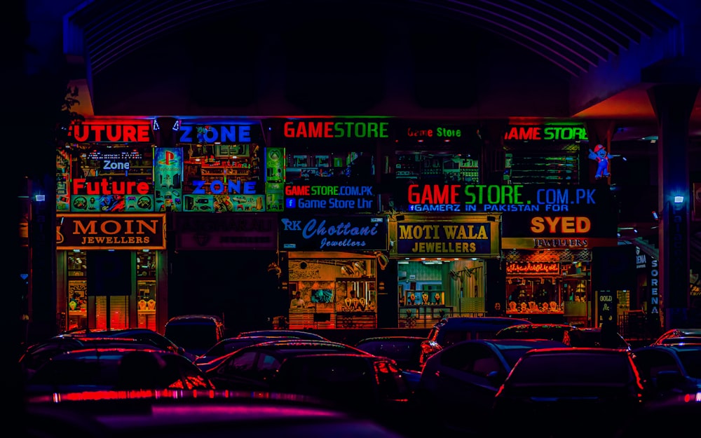 a bunch of cars parked in front of a store