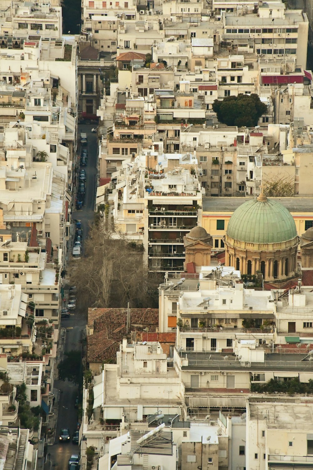 an aerial view of a city with lots of buildings