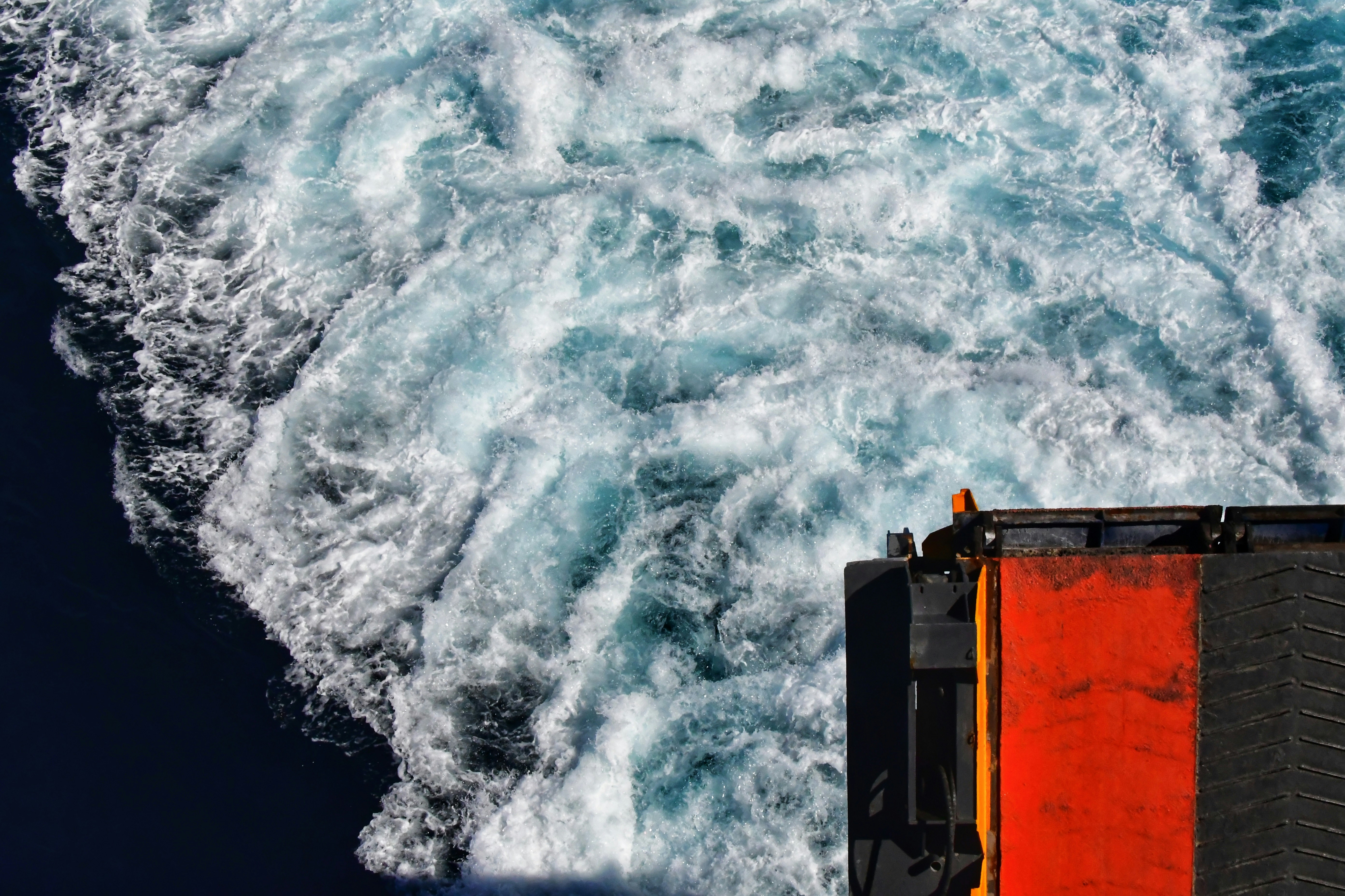 a large body of water with a boat in it