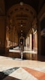 a person walking down a hallway in a building