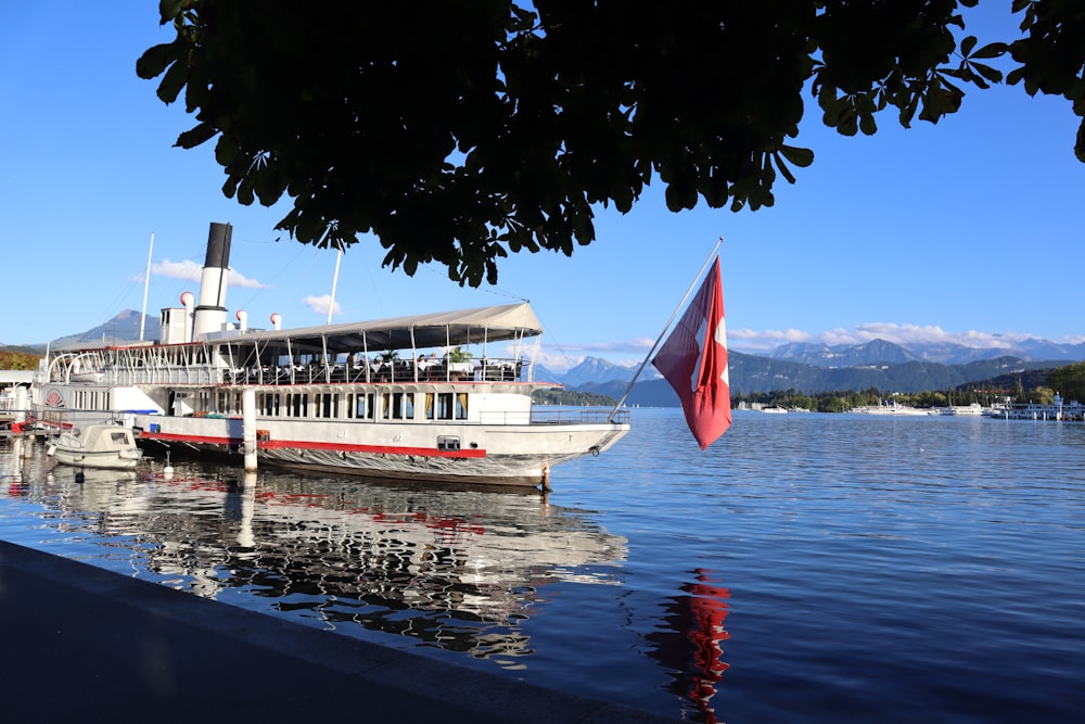 a large boat floating on top of a body of water