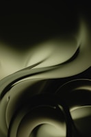 a black and white photo of a wavy design