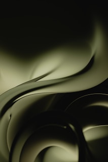 a black and white photo of a wavy design