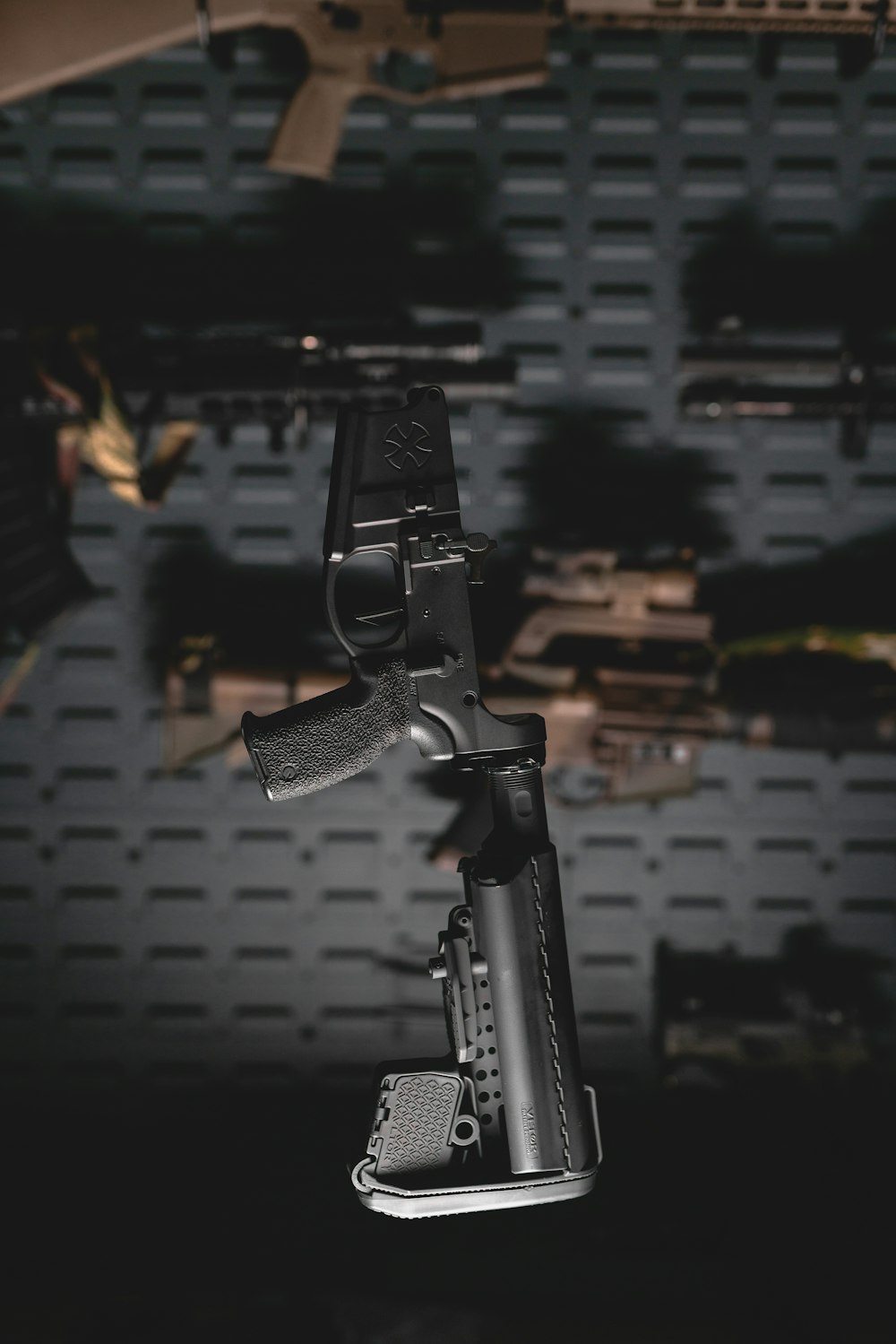 a close up of a gun on a tripod