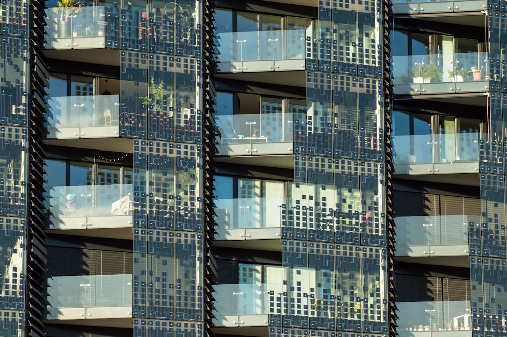 a very tall building with lots of balconies