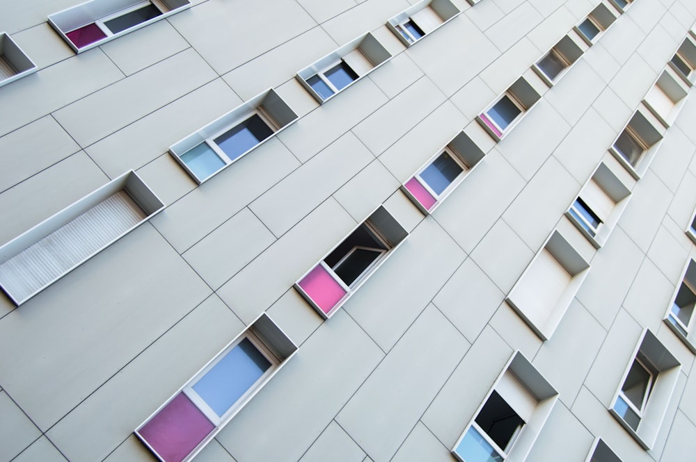 a tall building with lots of windows on the side of it