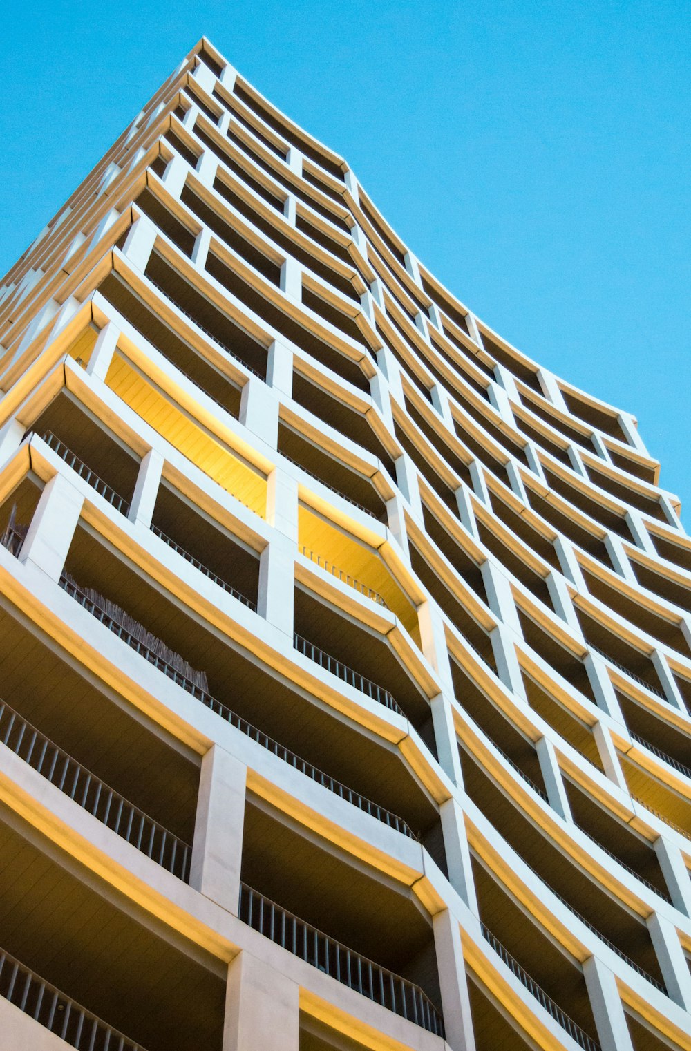 a tall building with balconies and balconies on it