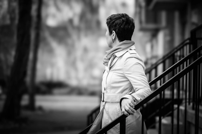Sophisticated sugar baby on the stairs of a Canadian building