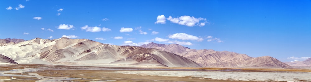 a mountain range with a river running through it