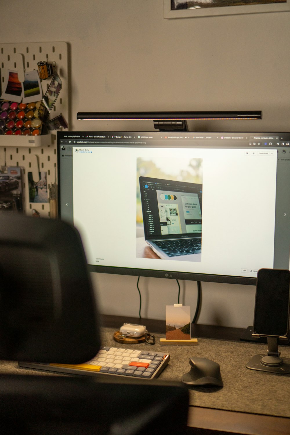 a computer monitor sitting on top of a desk