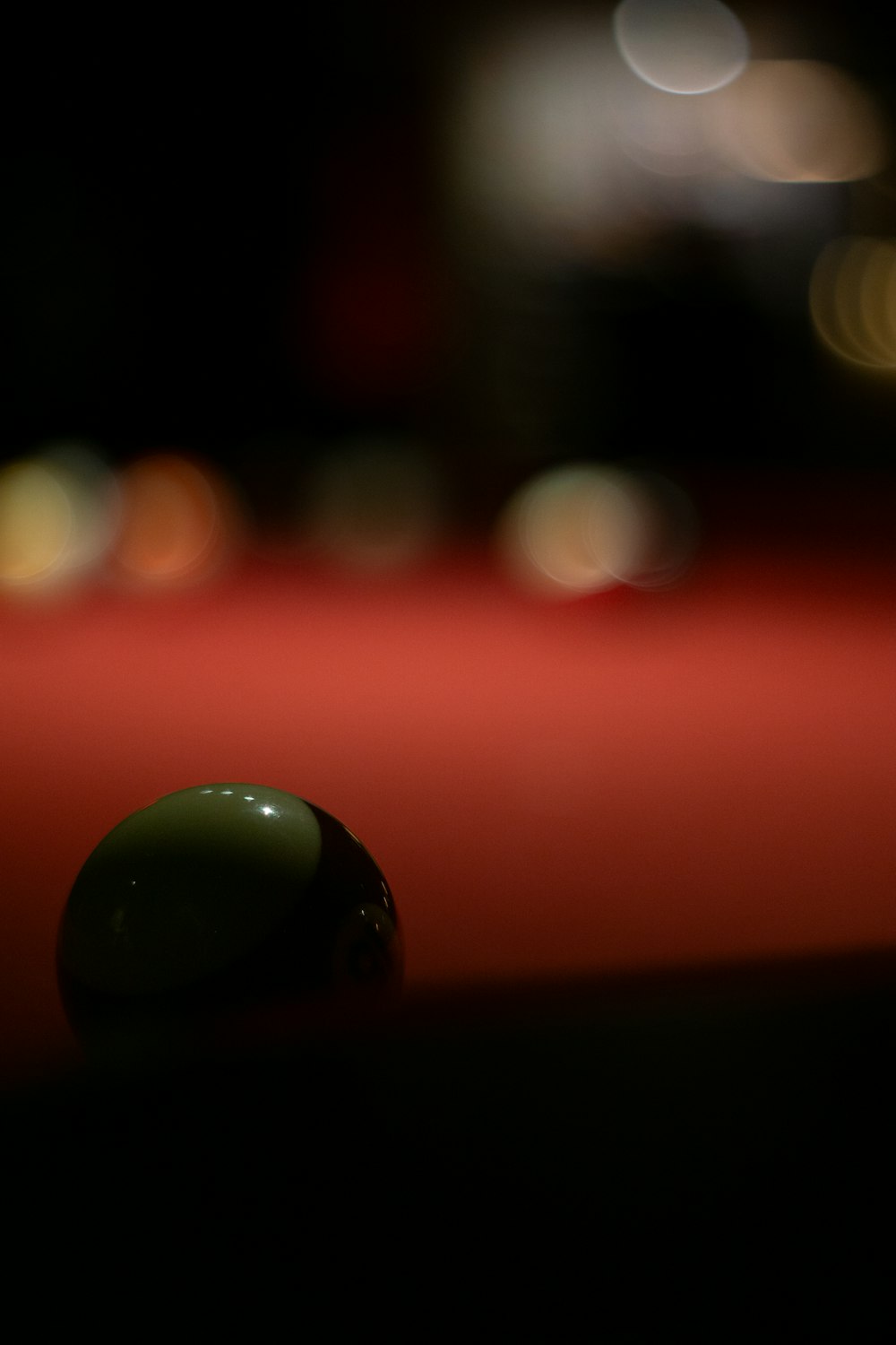 a close up of a pool ball on a pool table