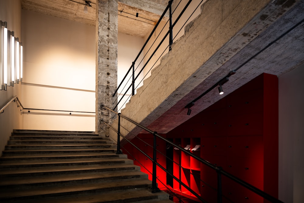 a set of stairs leading up to a red light