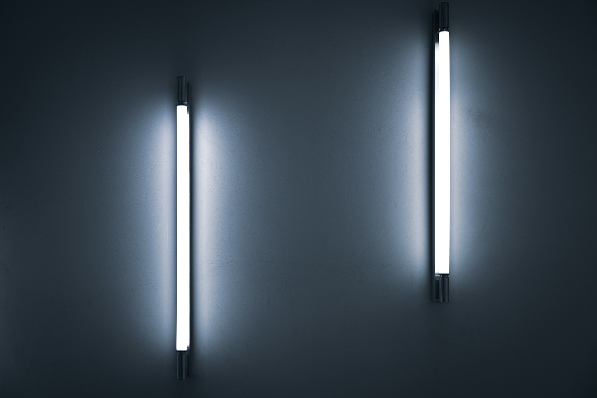 a couple of lights that are on a wall