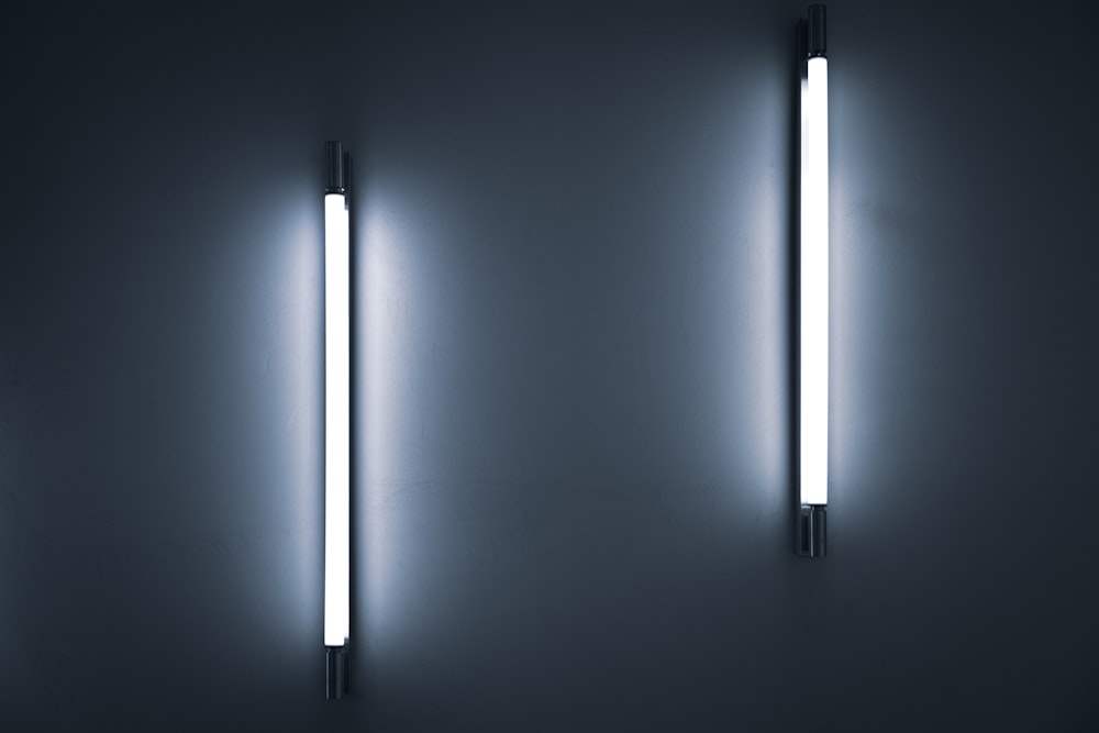 a couple of lights that are on a wall