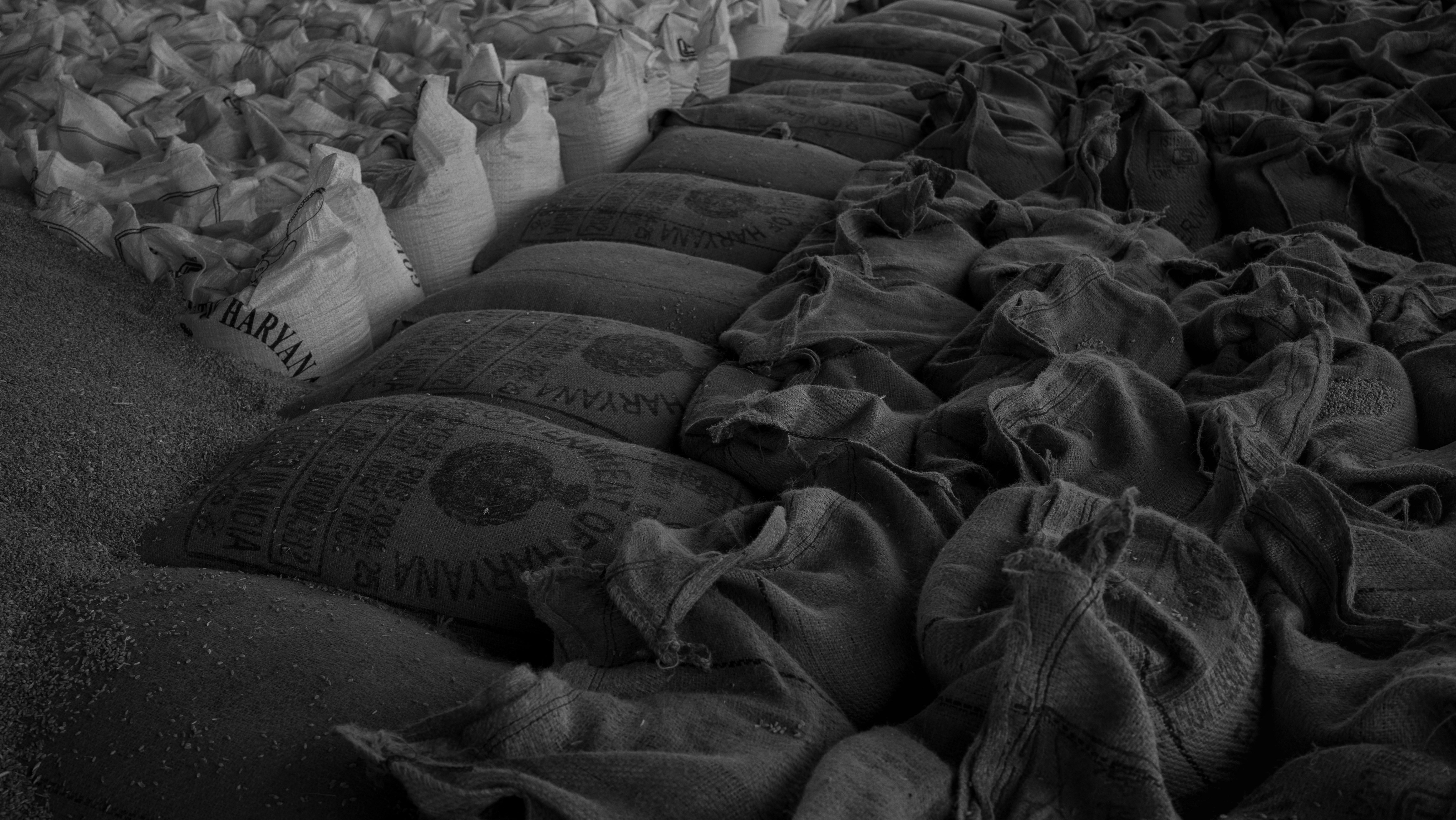 a pile of sand bags sitting on top of a floor