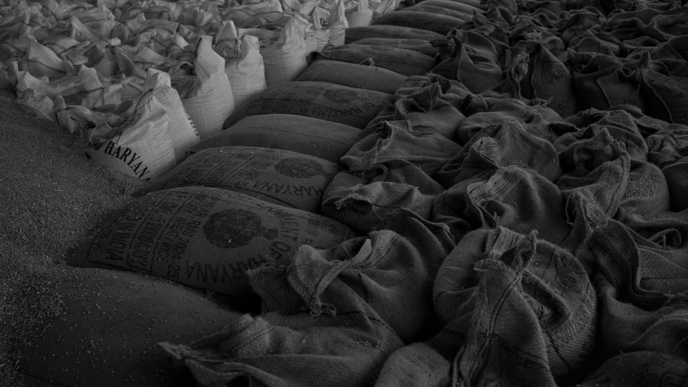 a pile of sand bags sitting on top of a floor