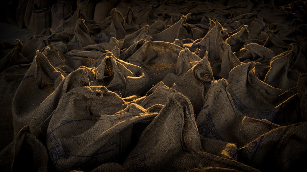 a bunch of bags that are sitting on the ground