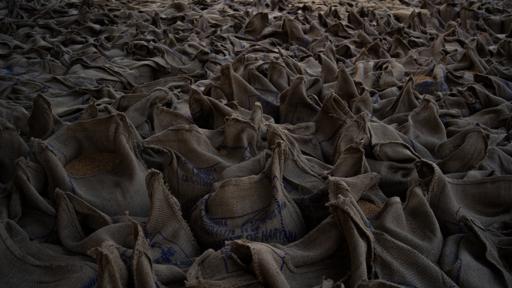 a lot of bags that are sitting on the ground