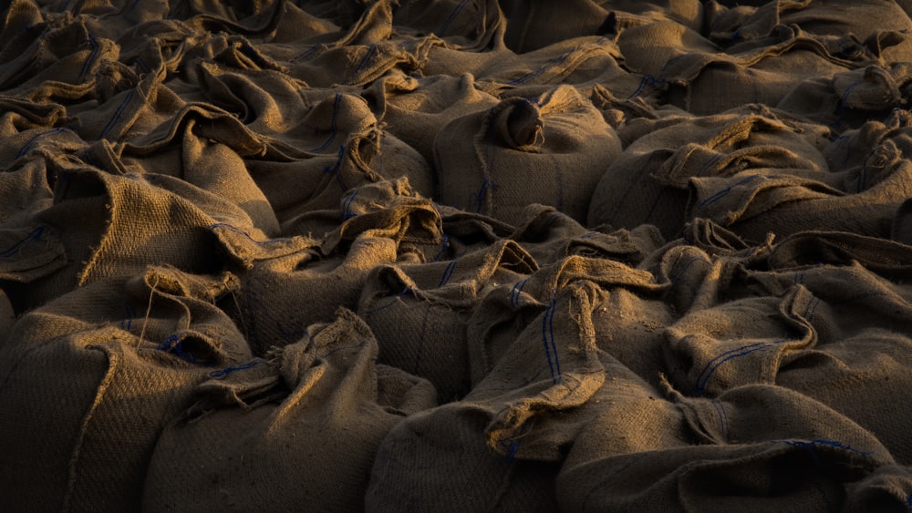 a bunch of bags that are sitting on the ground