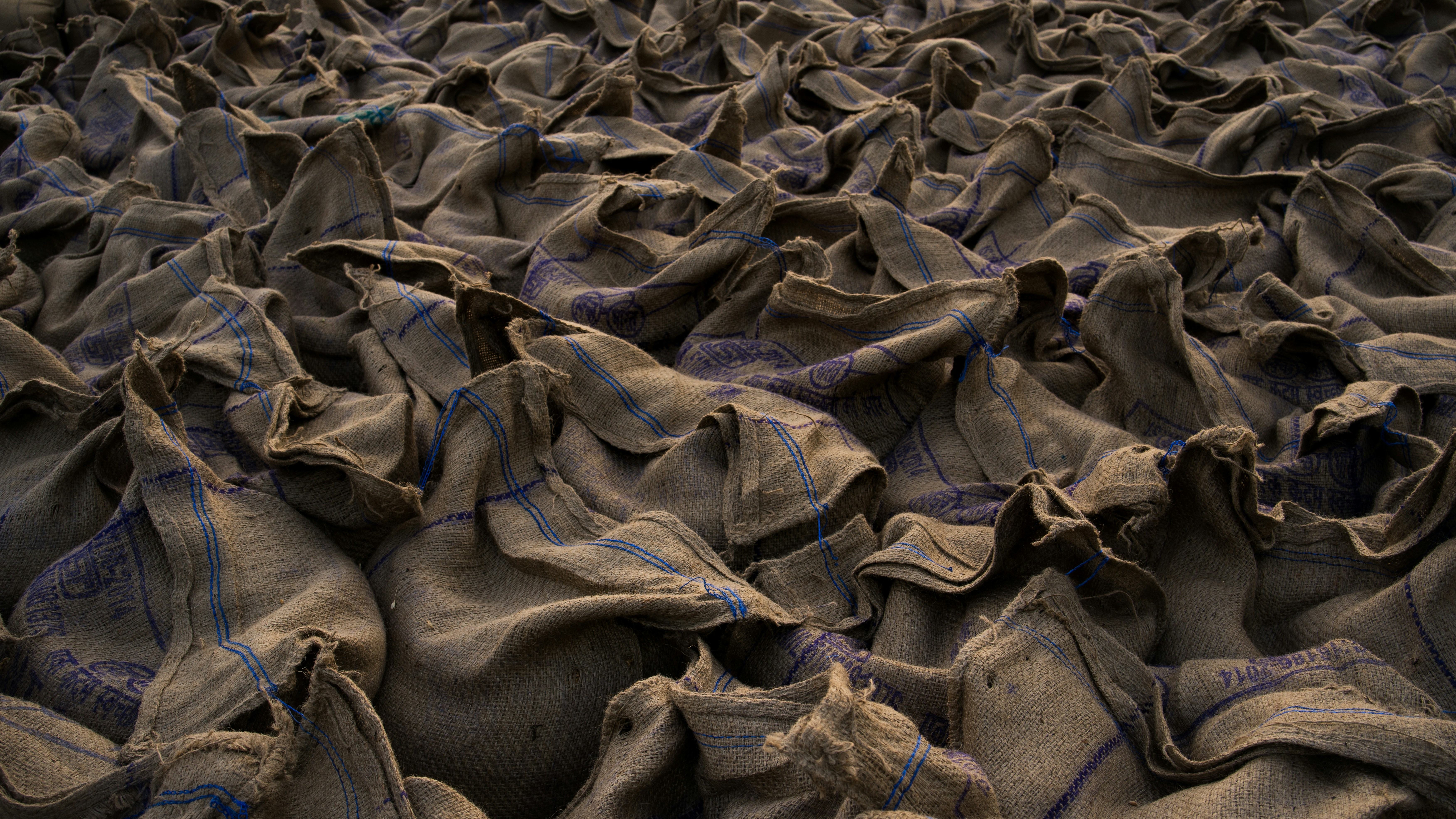 a bunch of bags that are sitting on the ground