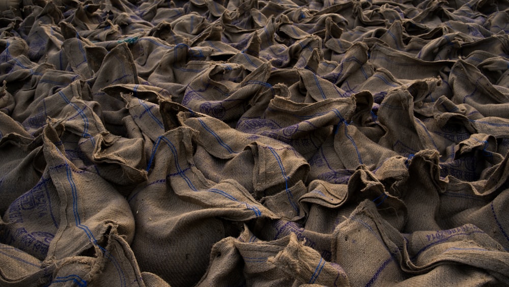 a bunch of bags that are sitting on the ground