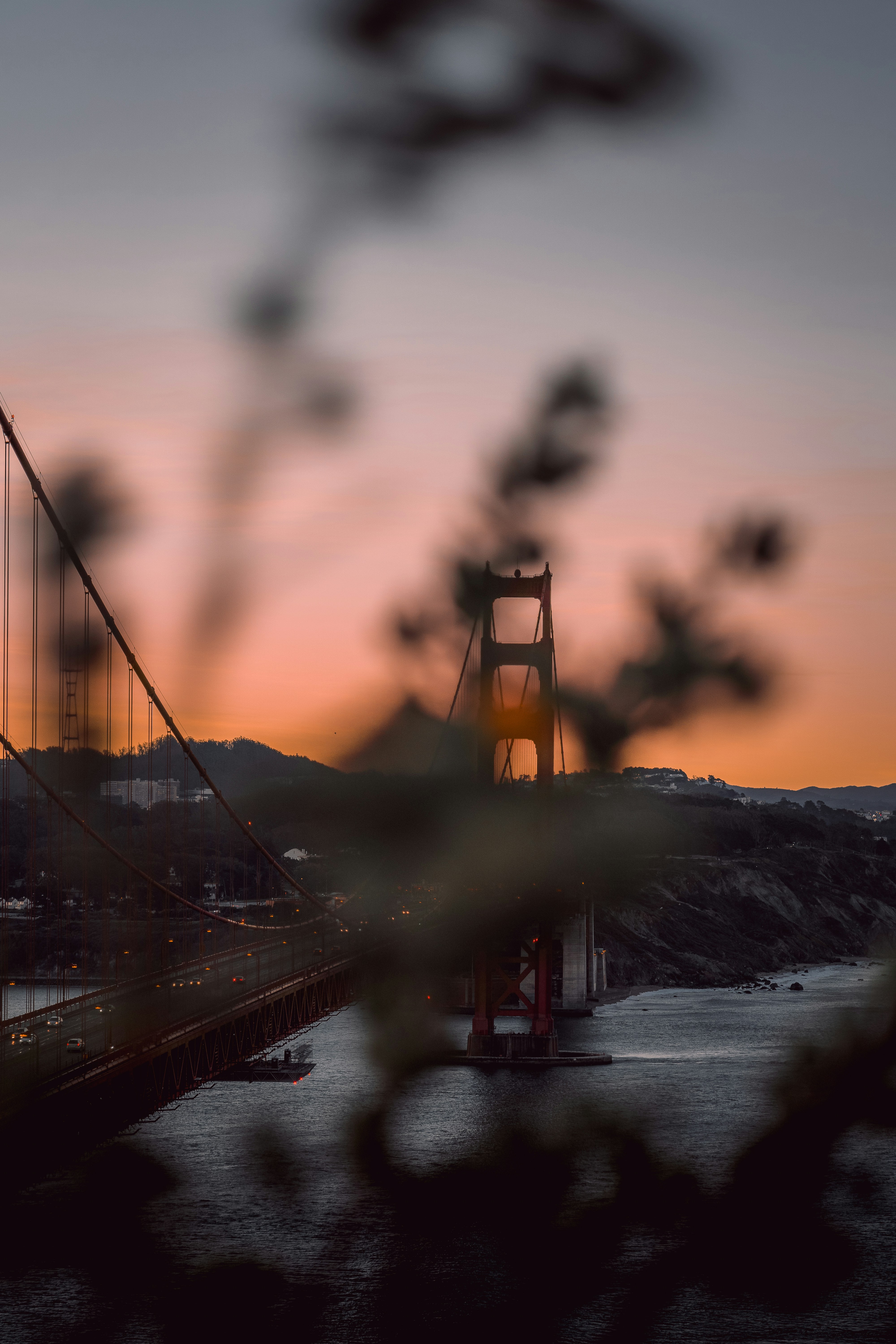 a view of the golden gate bridge at sunset