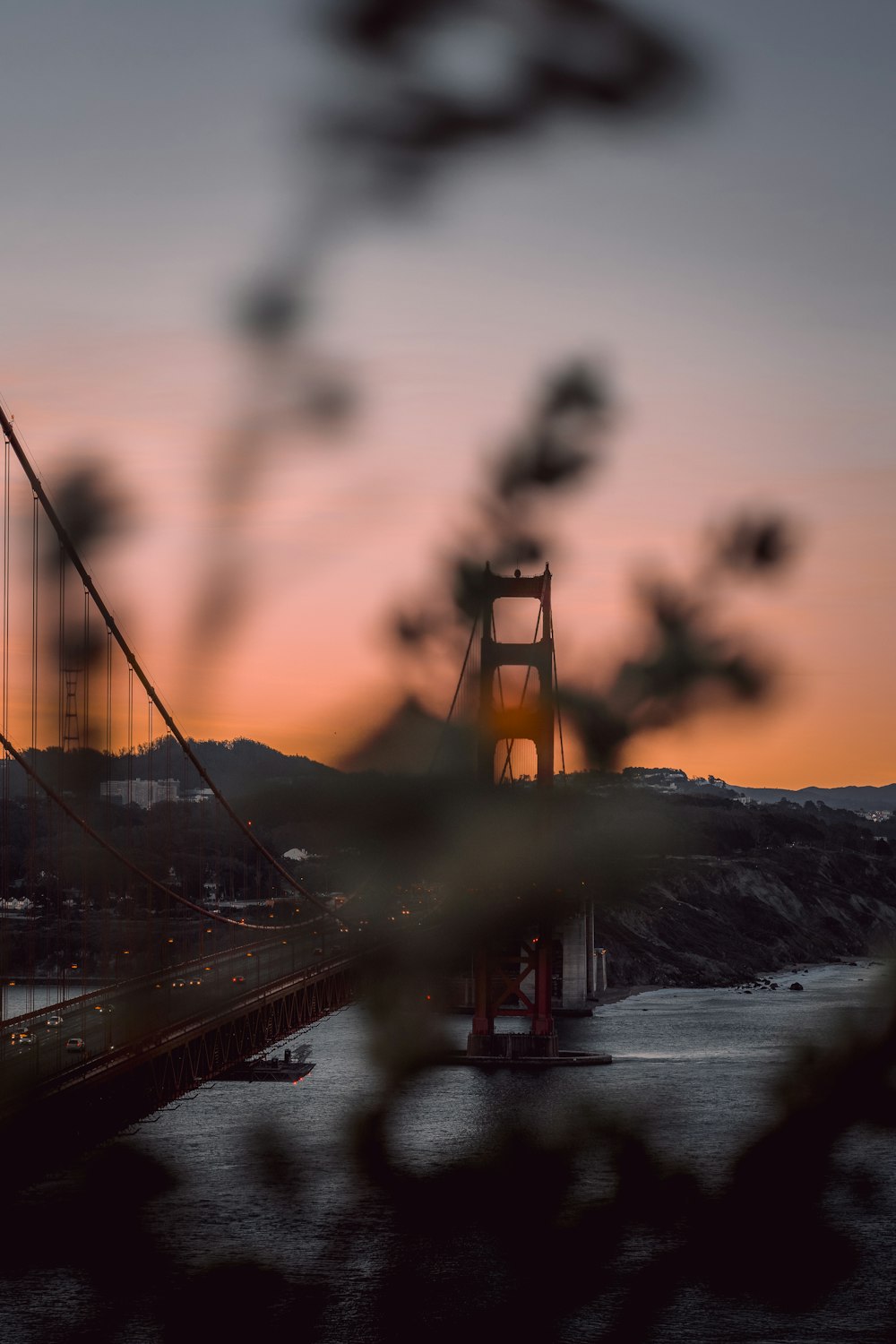 a view of the golden gate bridge at sunset