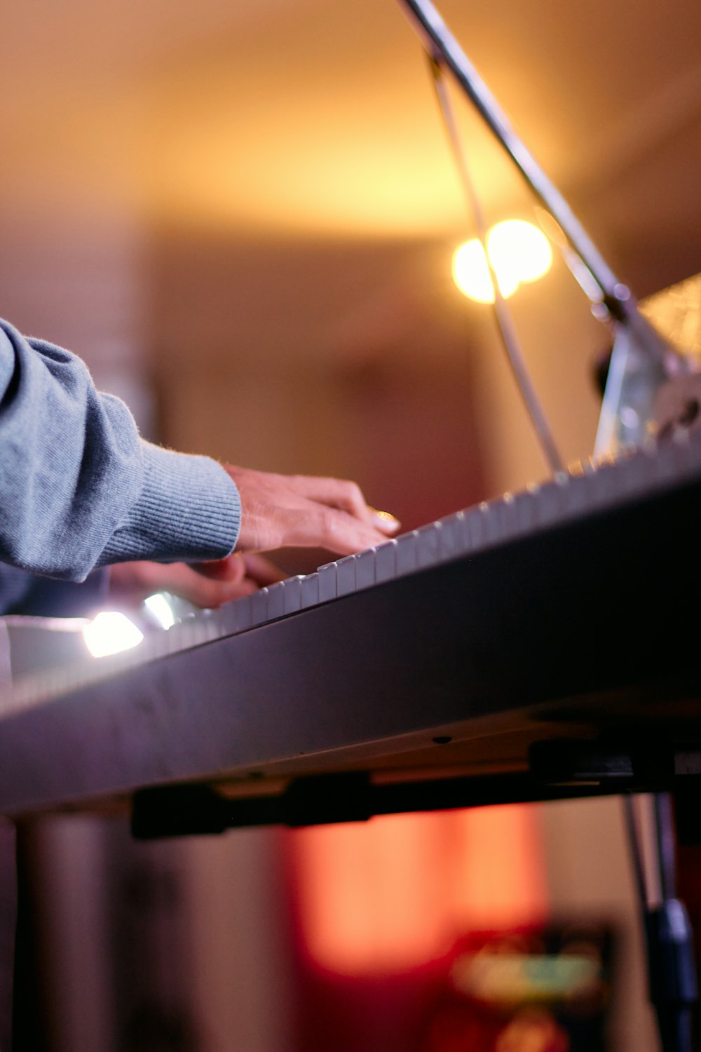 a close up of a person playing a keyboard