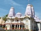 a large white building with many spires on top of it
