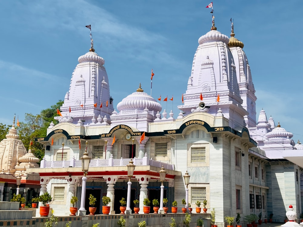 a large white building with many spires on top of it