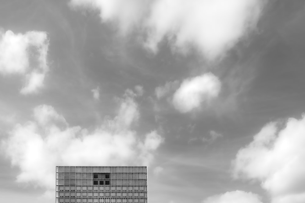 a black and white photo of a tall building