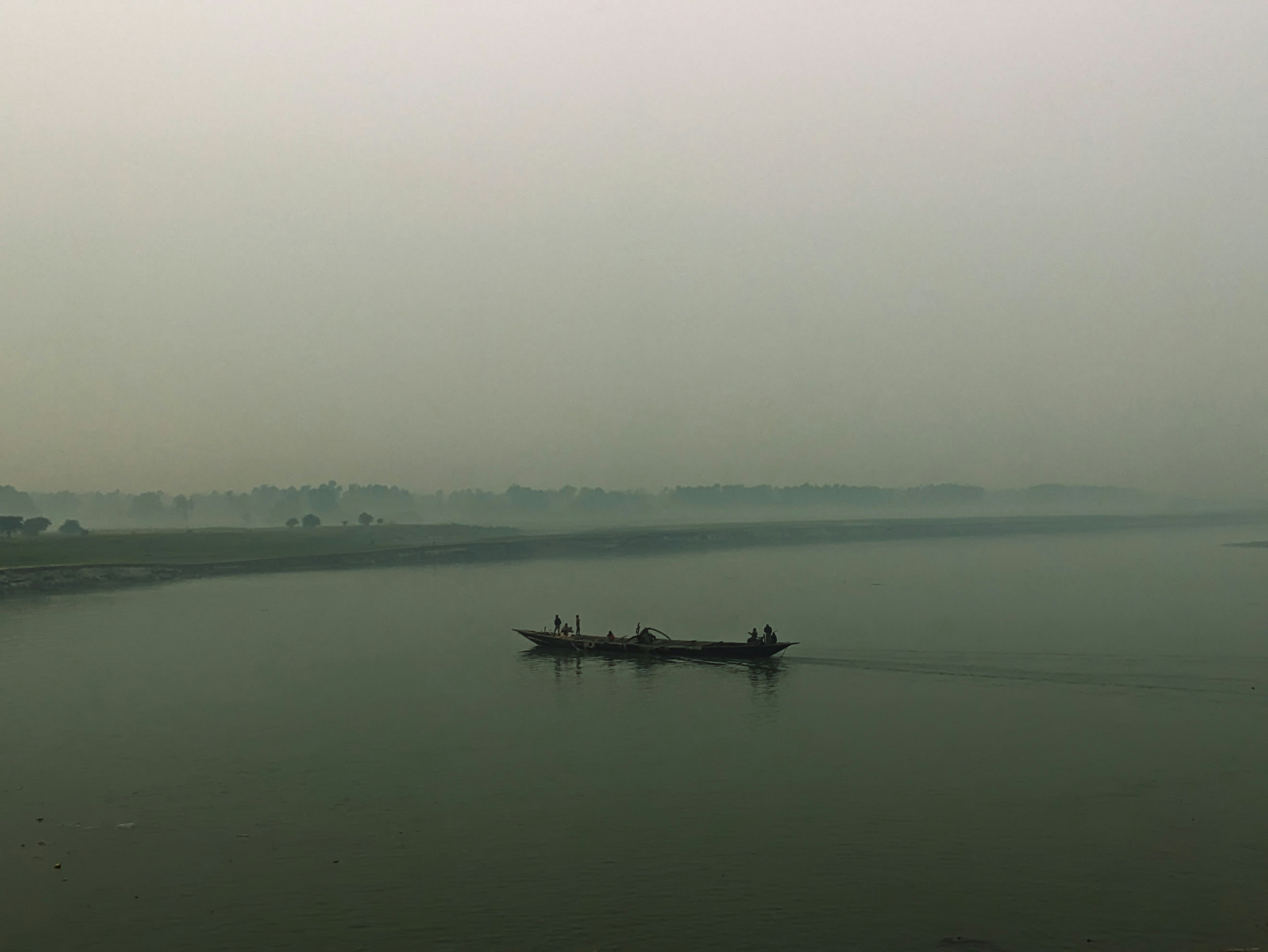 a small boat on a large body of water