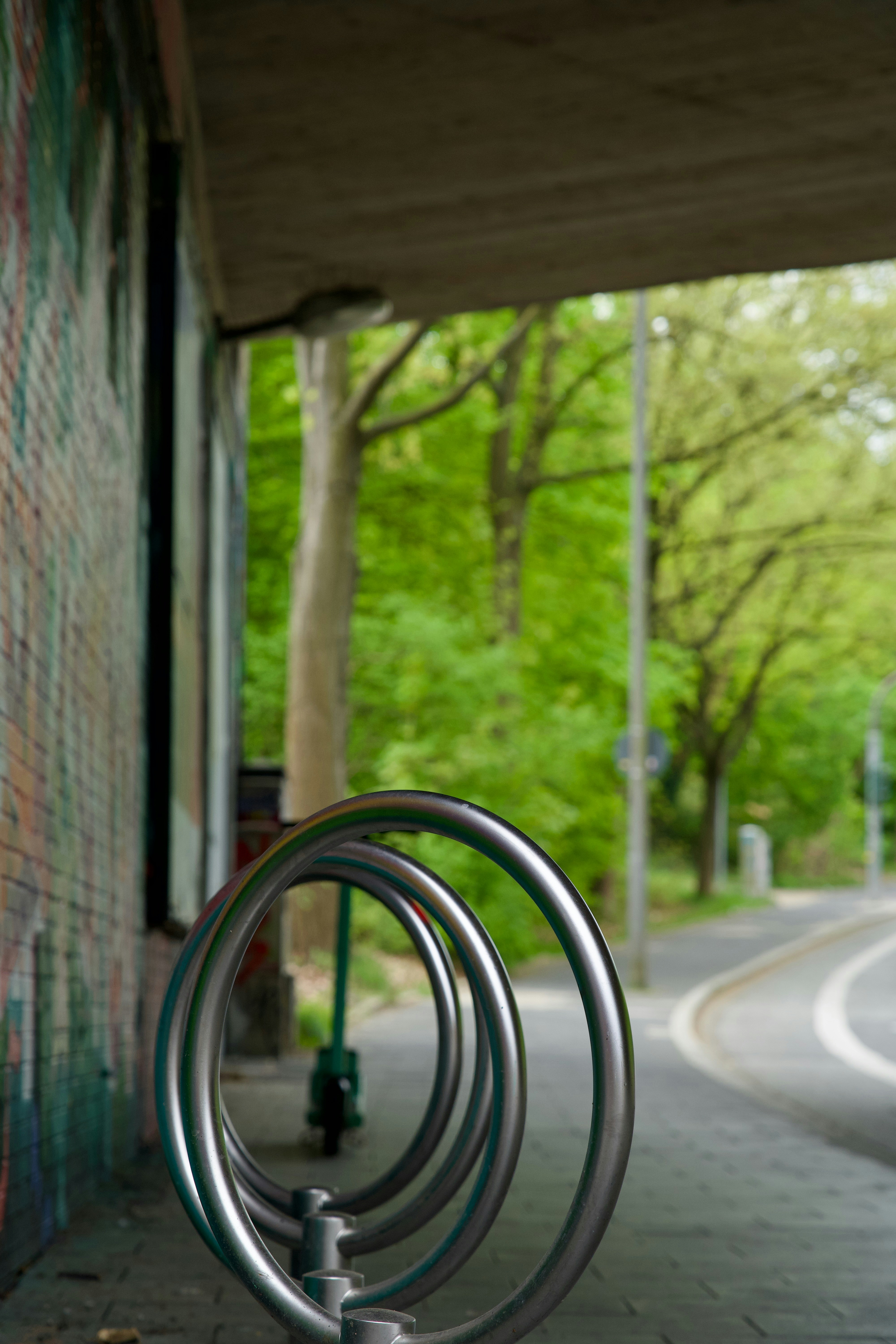 a metal sculpture on the side of a building
