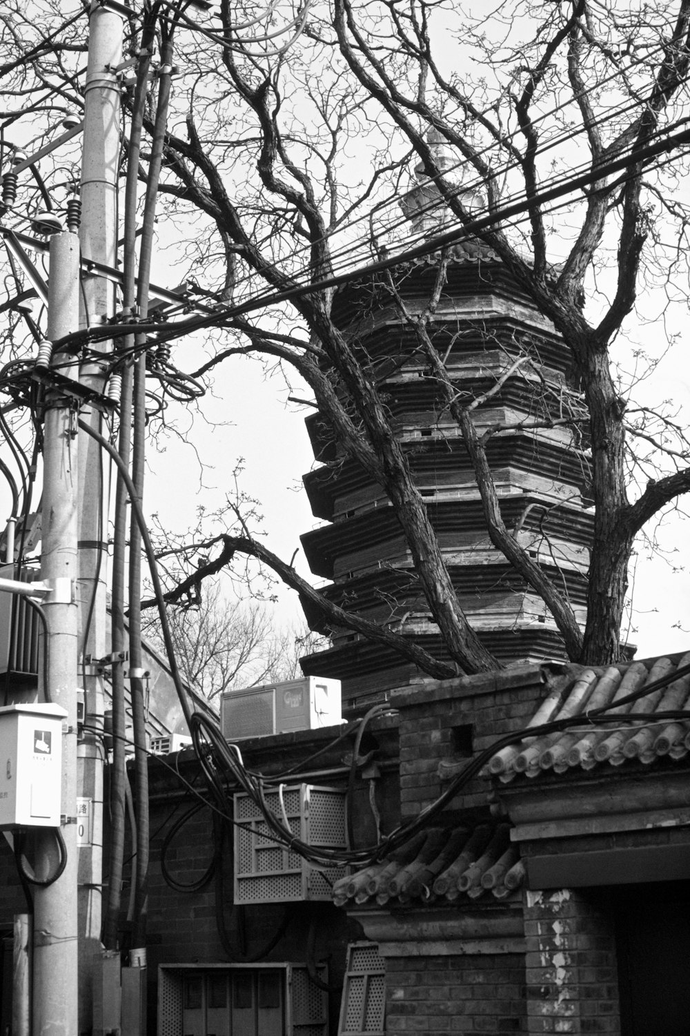 a black and white photo of a tall tower