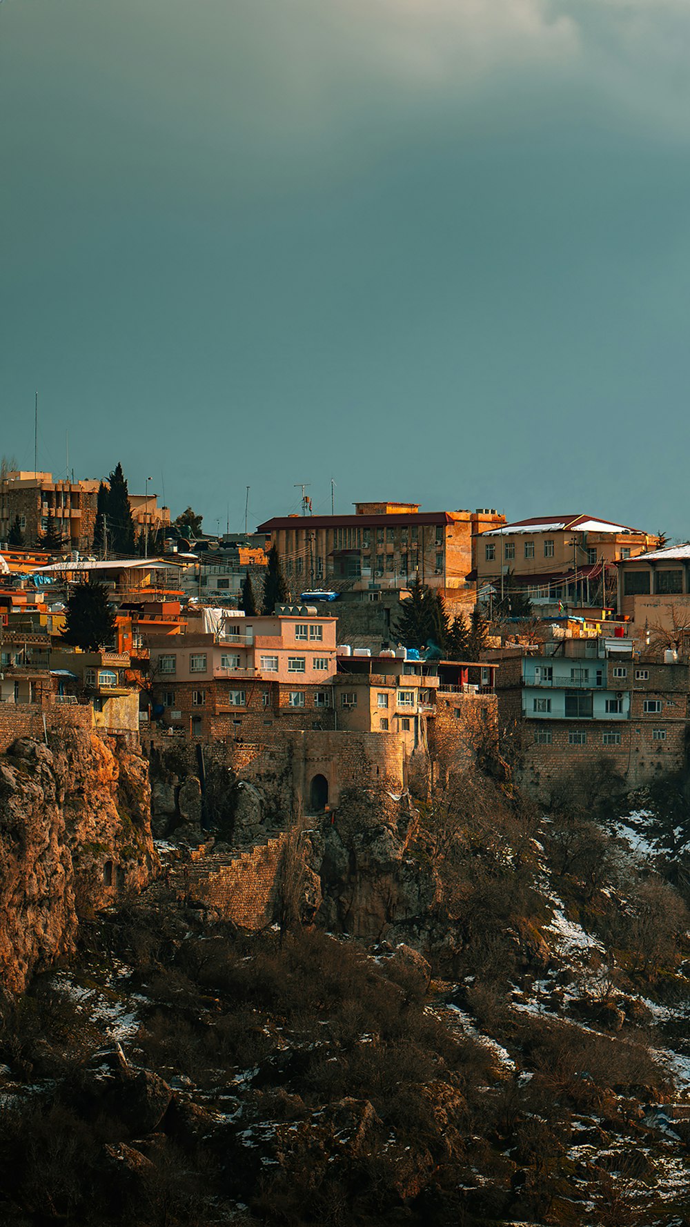 a view of a city with a mountain in the background