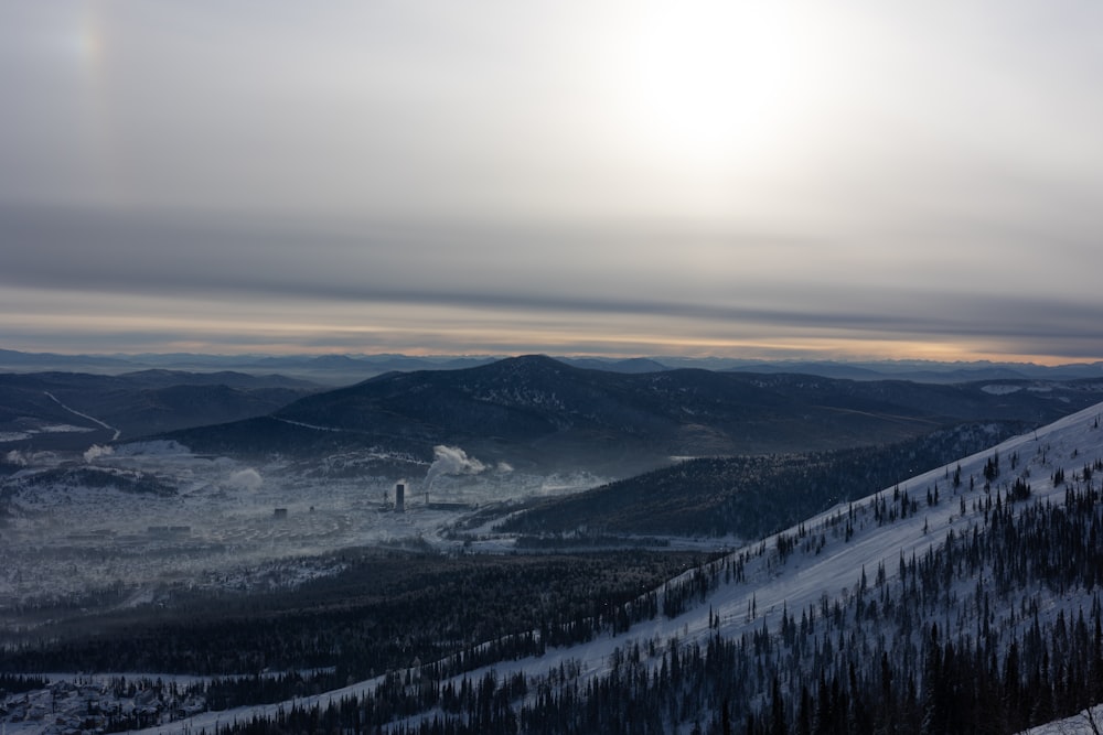 a person on a snowboard on a snowy mountain