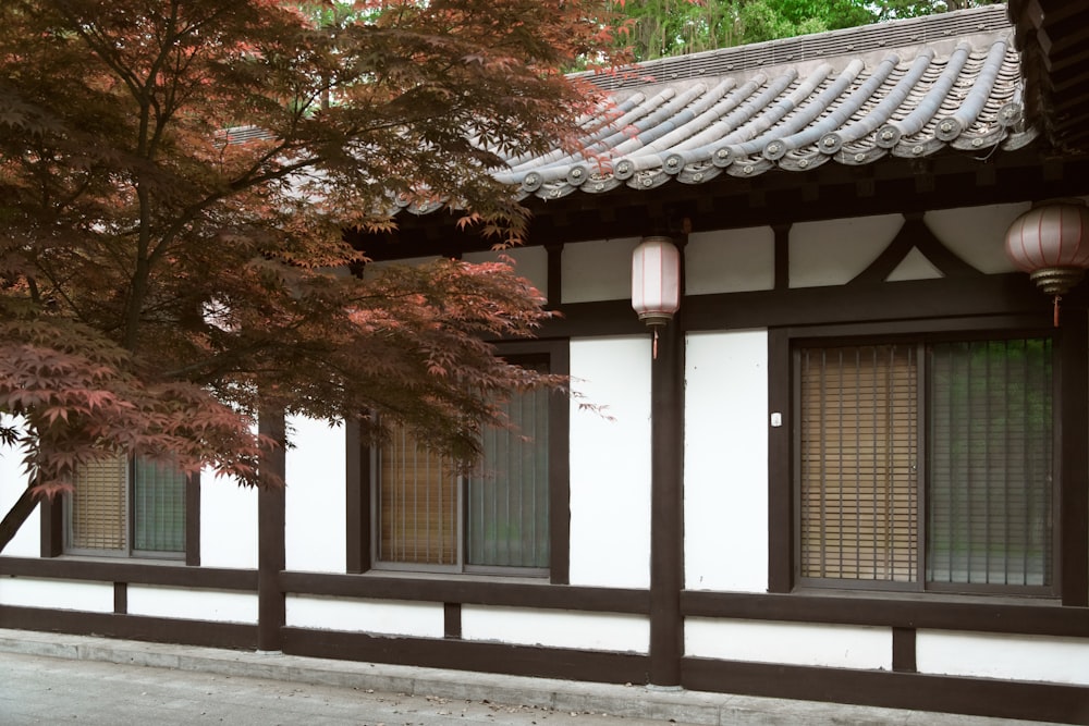 a building with a tree in front of it