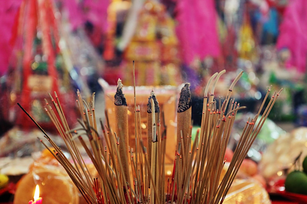 a close up of candles on a table