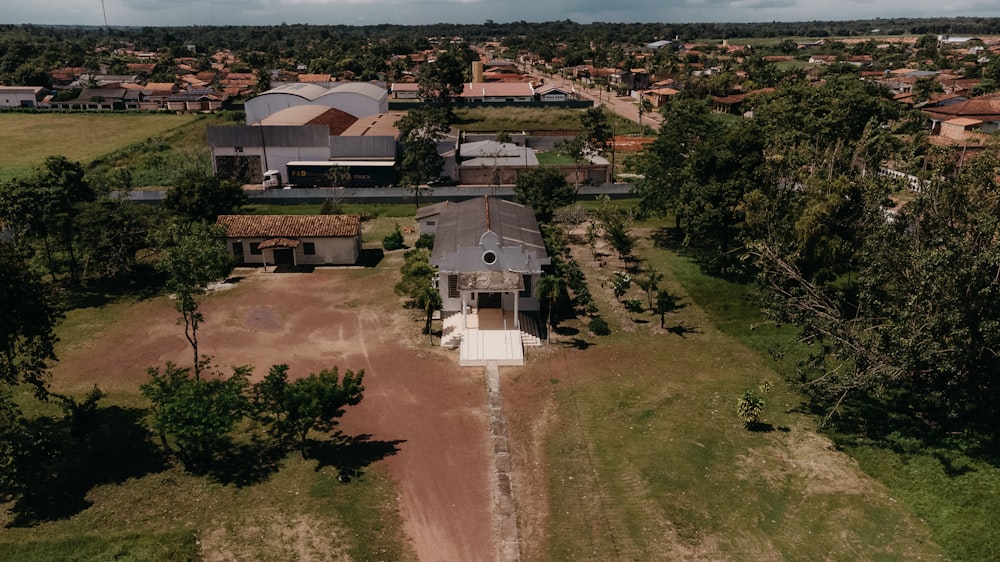 an aerial view of a house in a rural area