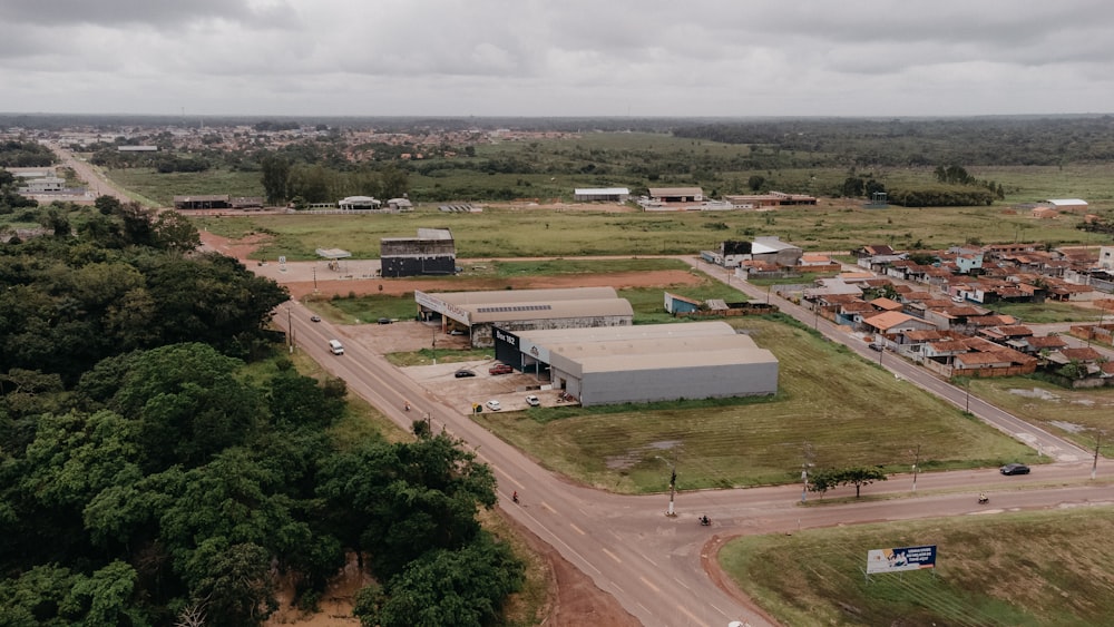 an aerial view of a small town with a lot of trees