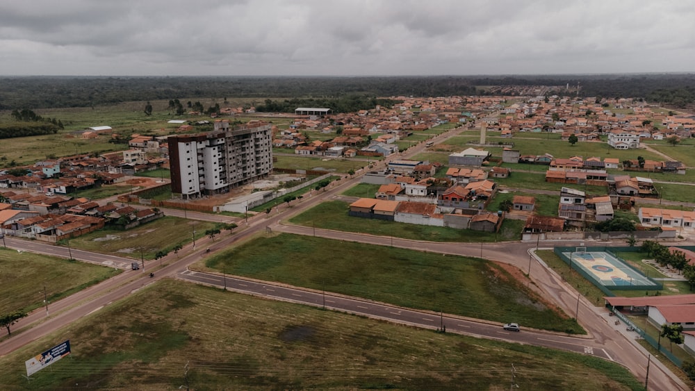 an aerial view of a city with lots of buildings