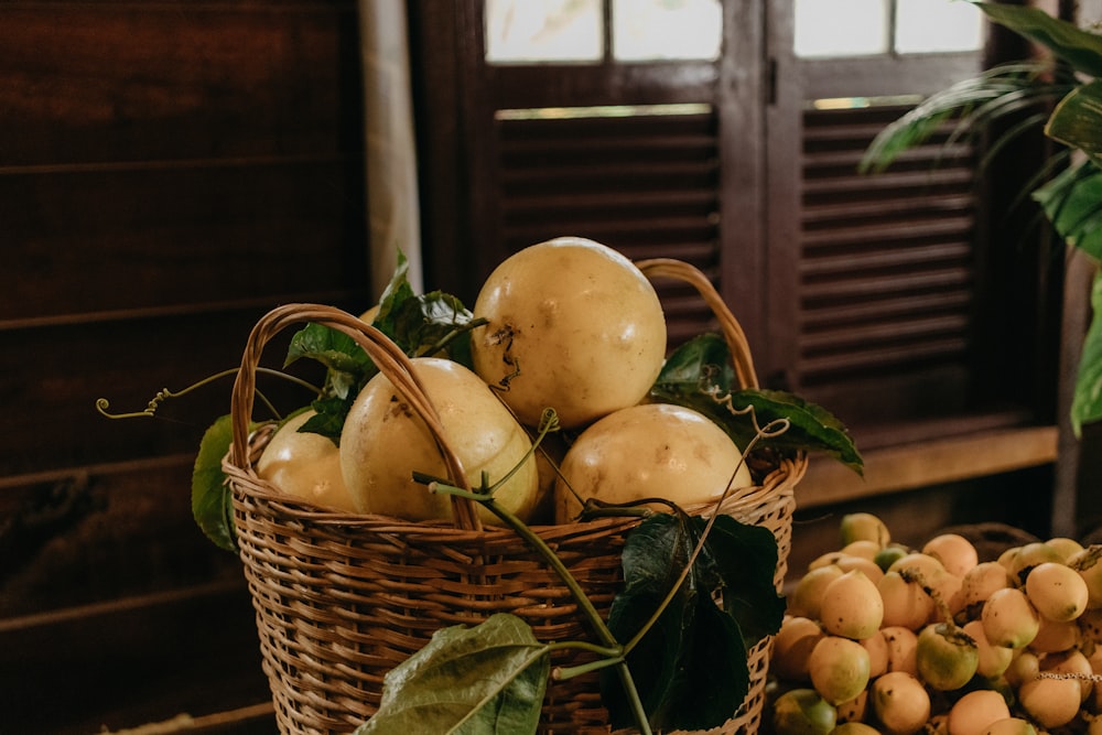 a basket of fruit sitting on a table