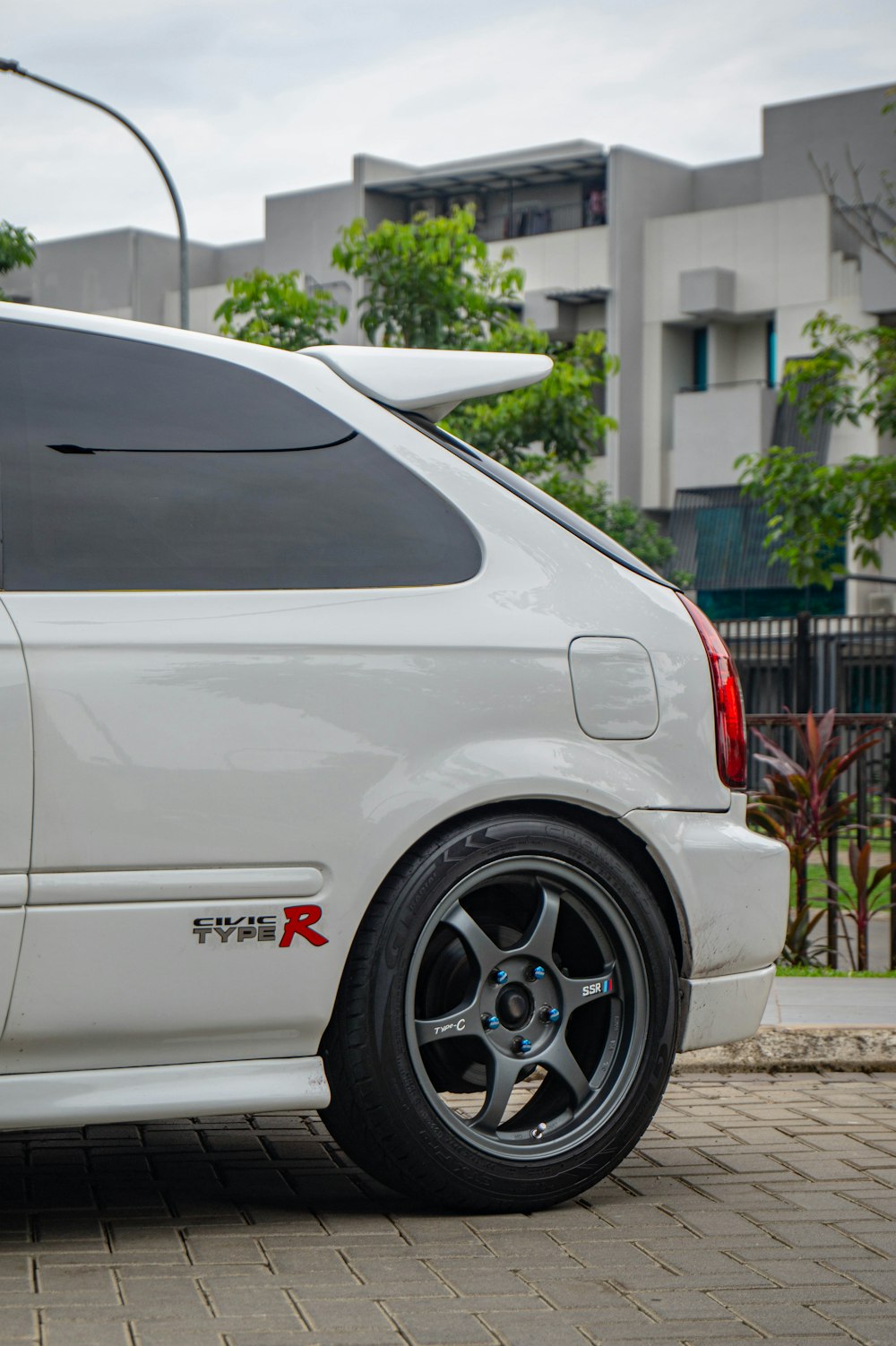 a white car parked on the side of the road