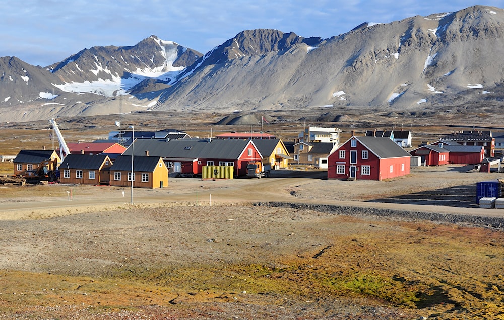 a bunch of houses that are sitting in the dirt