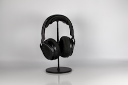 a pair of headphones on a stand