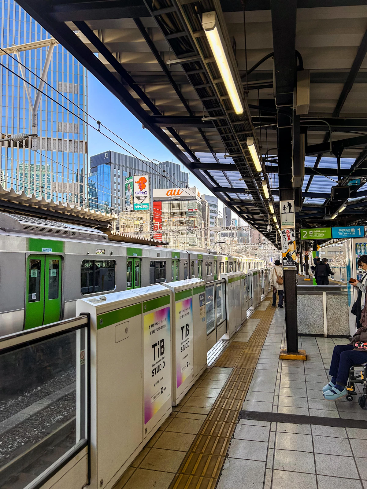 A train stopped at a Tokyo station platform