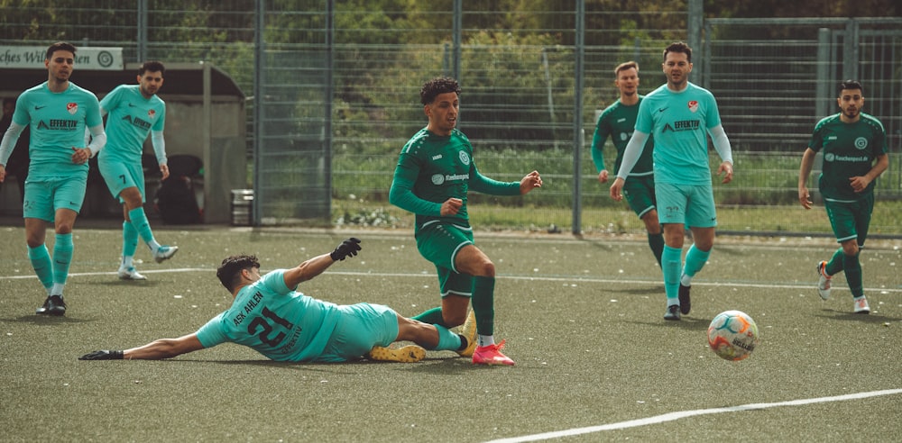 a group of young men playing a game of soccer