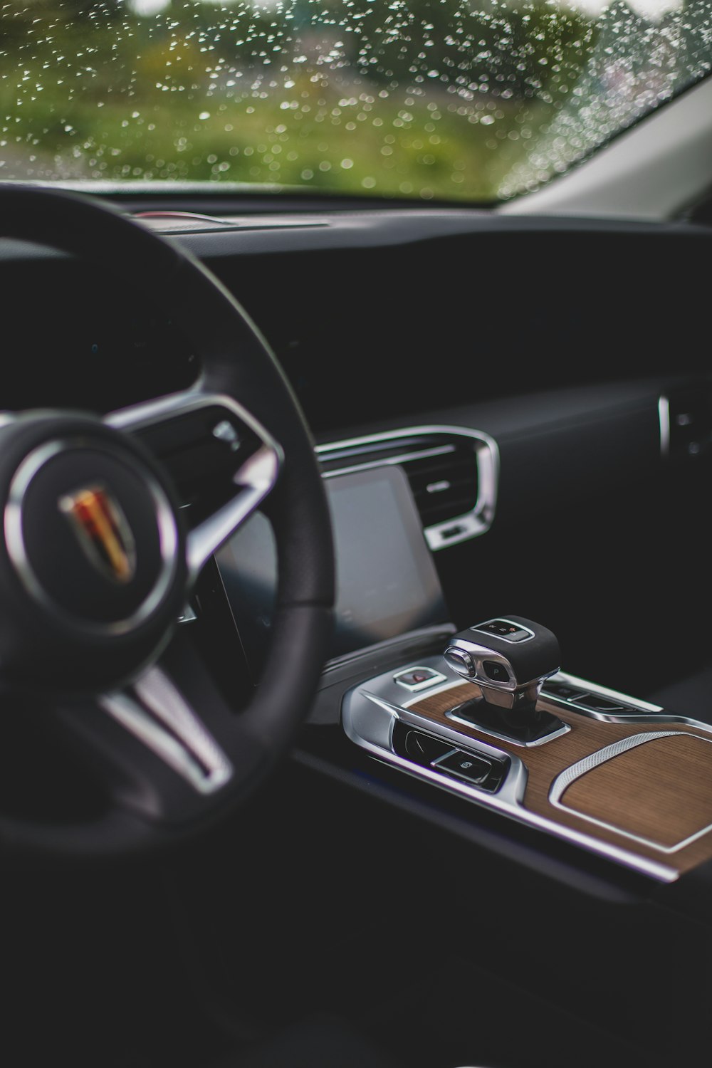 a steering wheel and dashboard of a car