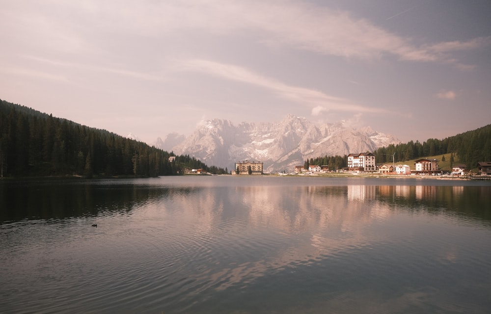 a body of water with a mountain in the background