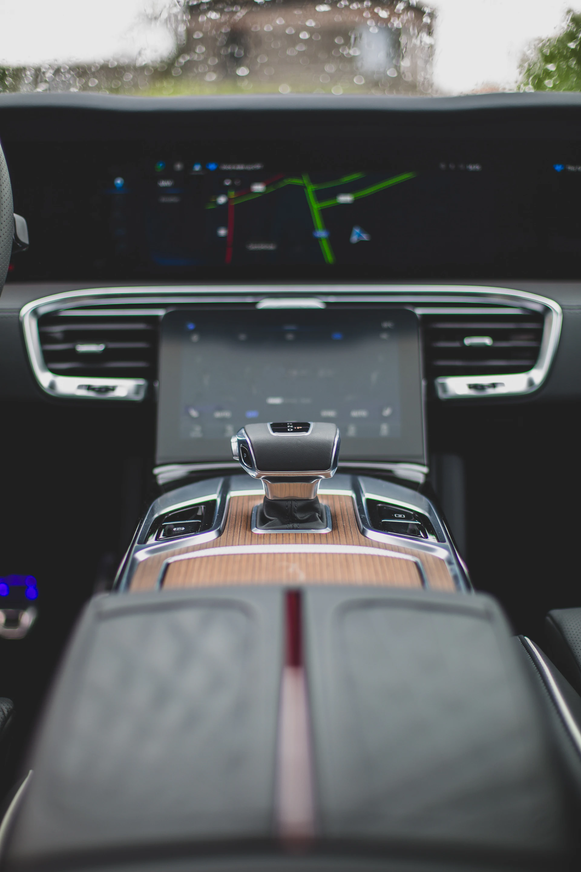 the dashboard of a car with a clock on it